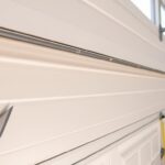 how to install weather stripping on garage door